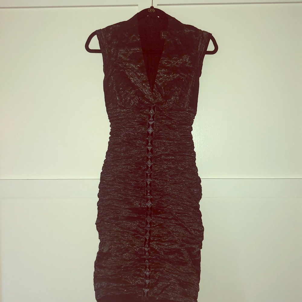 Black form fitting Deep V midi dress